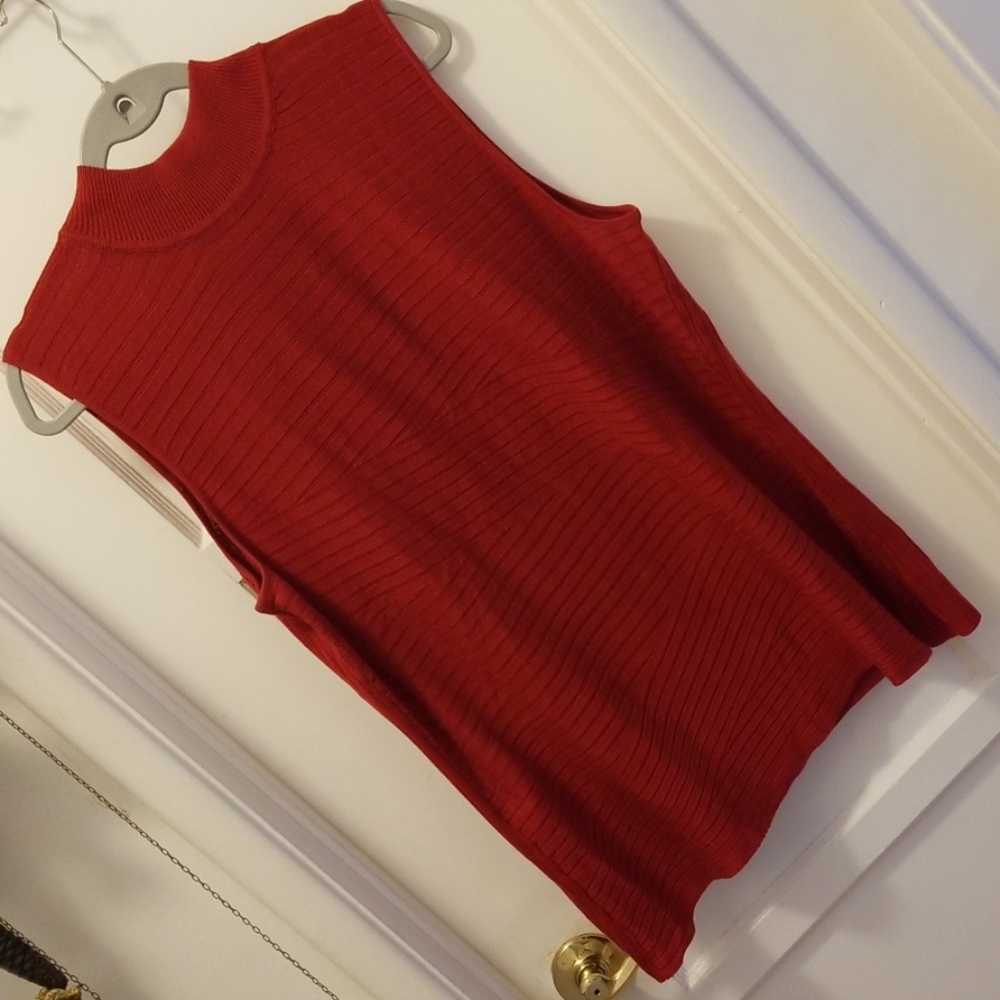 Red sleeveless blouse